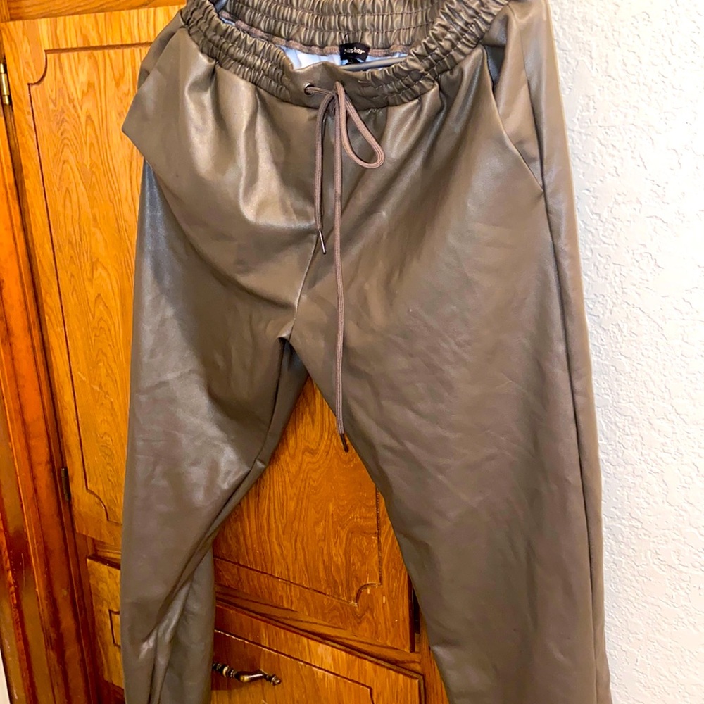 Mud green leather jogger pants
